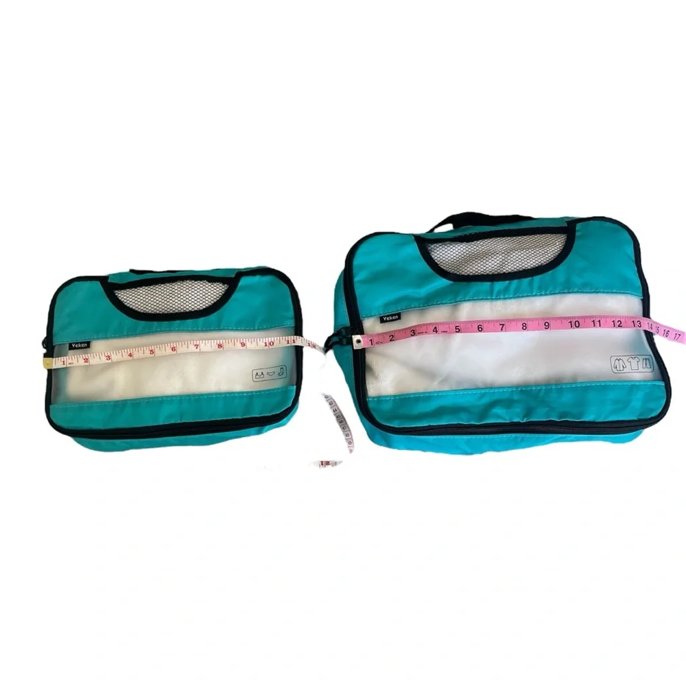 NWOT Teal and Clear Packing Cubes - Set of 4